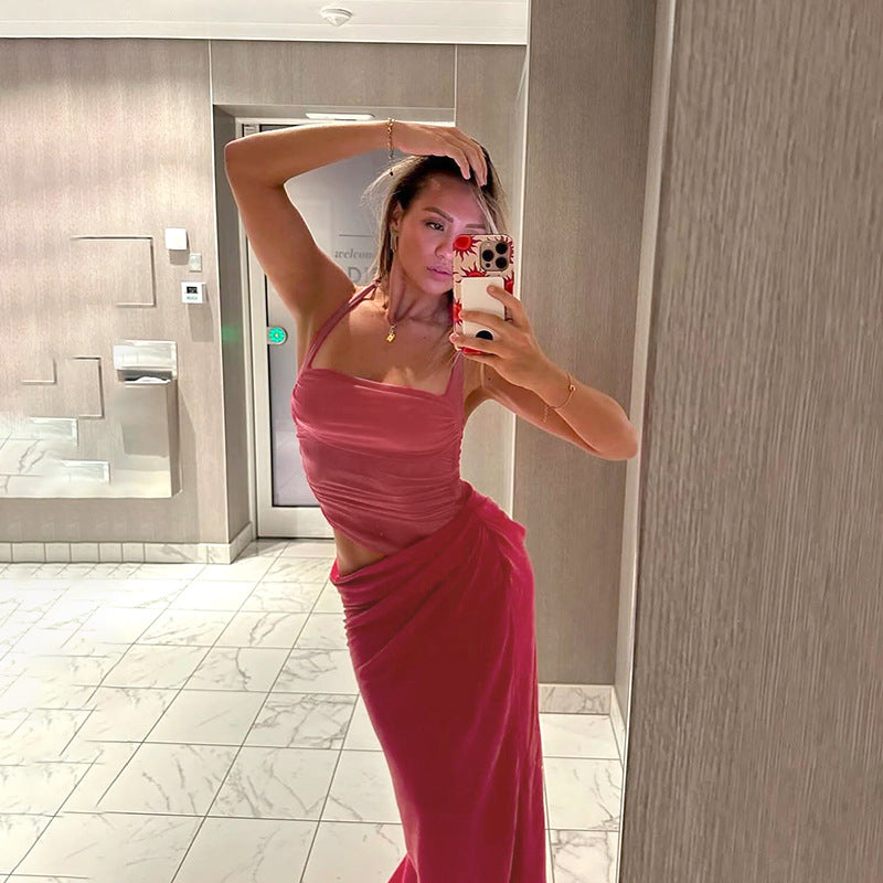 Sukienka maxi z dekoltem halter i przezroczystym detalem w talii